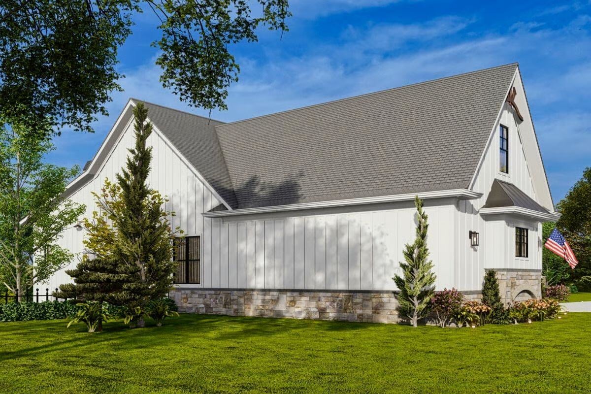 Back Exterior View of The Craftsman Lake House with Walkout Basement by Architectural Design and Triple Crown in Raleigh in White